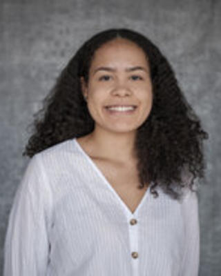A headshot of Carla Macias
